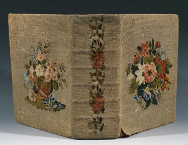 A floral needlepoint Bible cover from the collection